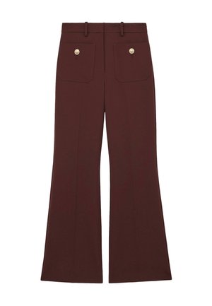 Bordó színű, bővülő szárú nadrág két hátsó zsebbel, aranyszínű gombdíszítésekkel, sima anyagból és szabott derékpánttal, amely karcsúsított megjelenést kölcsönöz.