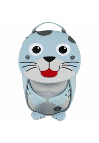 Light blue children's backpack shaped like a seal, featuring a round head with large eyes, a smiling mouth, and flipper-like straps.