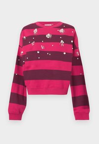 Sweatshirt cropped às riscas rosa e vermelho escuro com embellishments bordados e strass. Tecido de algodão com punhos e bainha canelados.