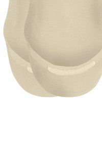 Beige Schuhinnenfütterungen mit glatter Textur, runder Form und einem leicht erhöhten Rand entlang der Öffnung für einen sicheren Sitz. Weiches Stoffmaterial.