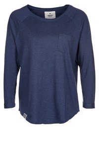 Navy blue long-sleeve top with a scoop neckline, raglan sleeves, and a small chest pocket. Soft fabric with a relaxed fit and curved hem.