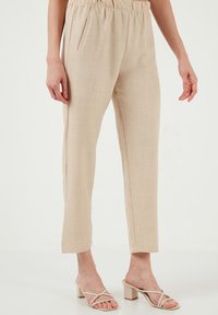 LELA REGULAR FIT - Hlače - beige