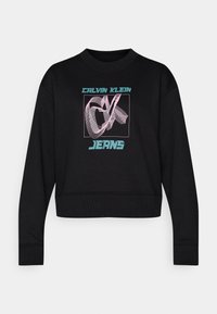 Sweat-shirt noir à manches longues avec poignets et ourlet côtelés, présentant un logo coloré Calvin Klein Jeans et un design abstrait sur le devant.