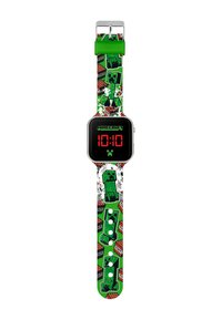 Montre numérique avec un cadran carré noir et un affichage LED rouge. Le bracelet est vert avec des motifs inspirés de Minecraft, incluant des designs de Creeper et de TNT.