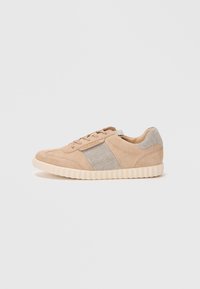 Beige suede sneakers with woven metallic accents and a textured cream rubber sole. Features lace-up design and cushioned sides.