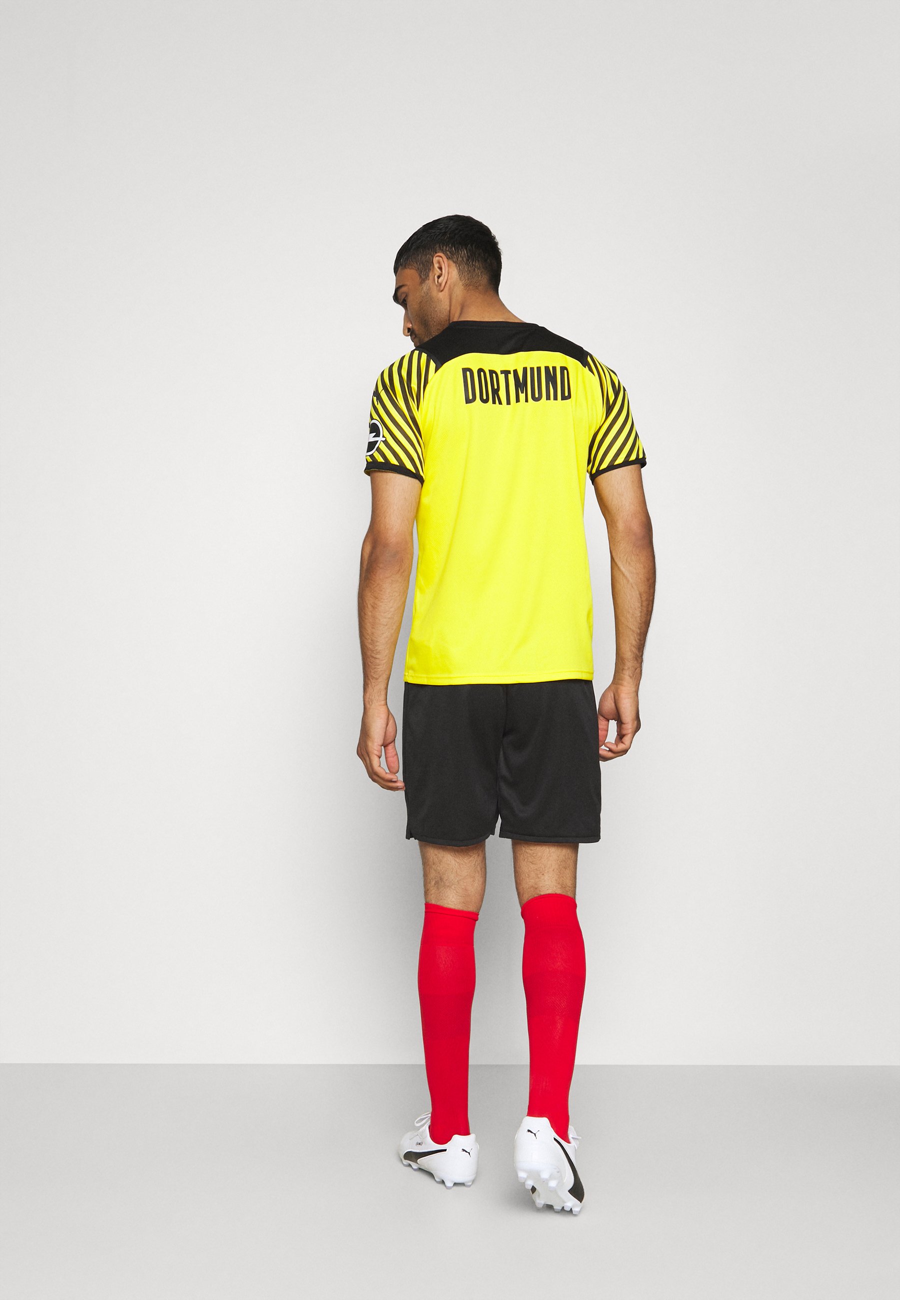 Puma BVB BORUSSIA DORTMUND - Pantalón corto de deporte - puma black/cyber  yellow/negro - Zalando.es