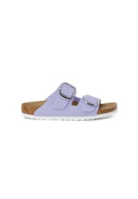 Purple canvas slide sandals featuring two adjustable silver buckles, a cork footbed, and a white rubber sole.