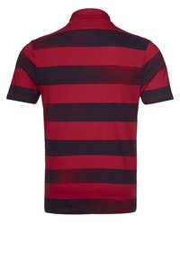 Short-sleeve polo shirt featuring red and navy horizontal stripes, textured fabric, and a collared neckline with a small loop at the back.