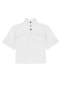 Short-sleeve white shirt made of cotton. Features a pointed collar, three button placket, and two front pockets with pleats.