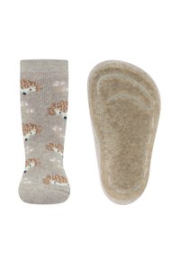 Braune und beige Socken mit einem Igelmuster. Weiche Stricktextur mit einem dezenten floralen Design. Rutschfeste Sohle.