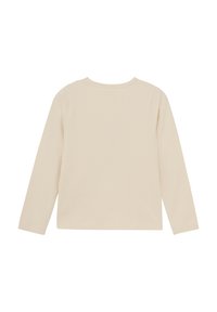 Beige langärmliges Baumwolloberteil mit rundem Halsausschnitt, zeichnet sich durch eine gerippte Textur und einen geraden Saum auf Taillenhöhe aus. Keine sichtbaren Beschläge oder Muster.