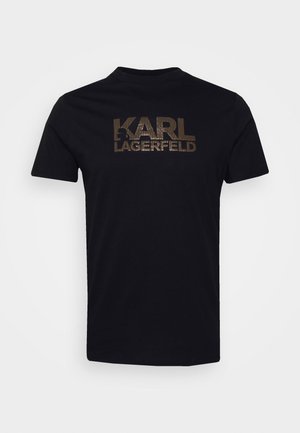 Schwarzes T-Shirt mit kurzen Ärmeln und Rundhalsausschnitt, auf der Brust mit dem Text „KARL LAGERFELD“ in großen, fetten Buchstaben.