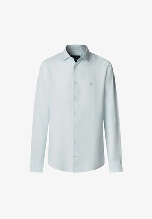 Ljusblå långärmad skjorta med knappar i linne. Har en krage, knappslå och en liten broderad logotyp på bröstet.