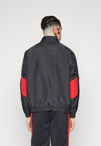Nike Sportswear AIR TRACKTOP - Trainingsjacke - black/university red