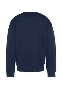 Felpa blu navy con collo rotondo, maniche lunghe e polsini e orlo a costine. Realizzata in morbido cotone, tessuto tinta unita.