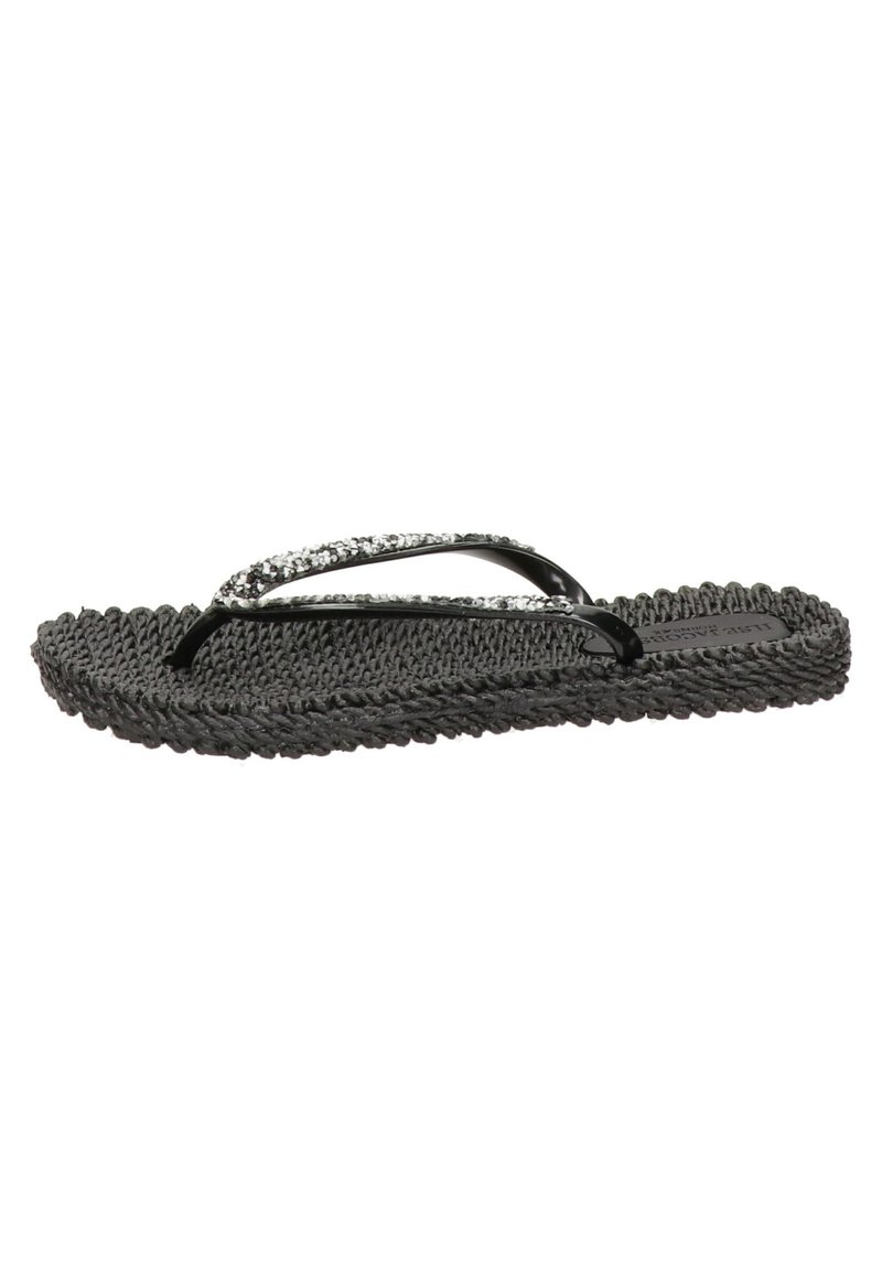 Infradito neri con suola in tessuto intrecciato, cinturini neri lucidi con una accentuazione glitterata. Design piatto che offre comfort casual per l'estate.