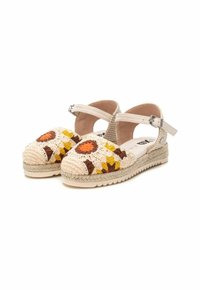 Sandales espadrilles tissées beiges avec broderie de tournesol en jaune, orange et marron. Bride à boucle et semelle en corde de jute.