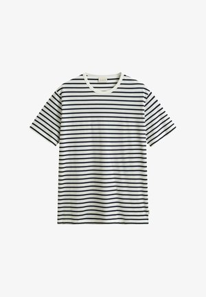 White short-sleeve t-shirt with evenly spaced horizontal black stripes, round neckline, and a small brand tag near the bottom hem.
