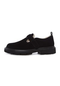 Sort ruskinds Mary Jane sko med en tyk gummisko sål og hvid fleece-foring, med en bred velcro rem hen over toppen.