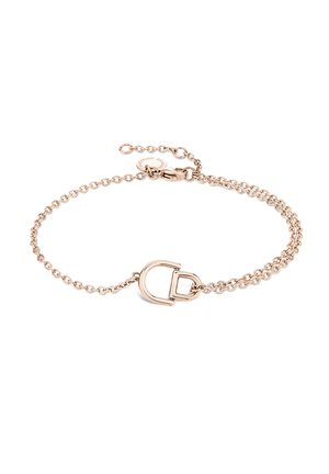 Armband aus roségold, mit Kettendesign und einem Verschluss sowie einem auffälligen Buchstaben "C" Akzent. Minimalistischer Stil, glatte Textur.