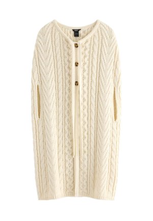 Stickad krämfärgad cardigan med ett texturerat mönster, med rundad halsringning, tre knappar fram och sidofickor.