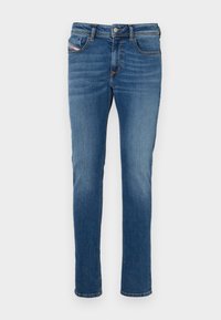Dark blue denim jeans with a slim fit, featuring a classic five-pocket design, subtle fading, and contrasting stitching details.