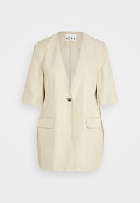 Ljusbeige blazer med korta ärmar och djup V-ringning. Har en enda knappstängning och två framfickor, strukturerad tyg.