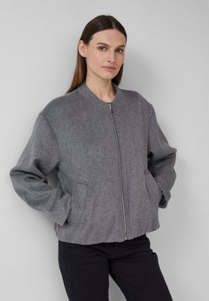 Graue Wollmischung Bomberjacke mit Reißverschluss, geripptem Kragen und Seitentaschen. Bietet eine lockere Passform und eine weiche Textur.