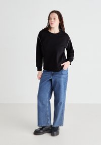 Vero Moda Curve VMCDAISY  - Ikdienas džemperis - black