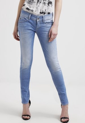 Jean slim - bleached denim