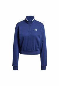 Blå zip-up sweatshirt med hög krage, elastisk midja och långa ärmar. Har en vit Adidas-logga på bröstet. Mjuk tygtextur.