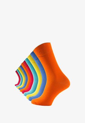 Set of colorful socks arranged in a gradient, featuring orange, red, blue, yellow, green, and turquoise shades, made of smooth fabric.