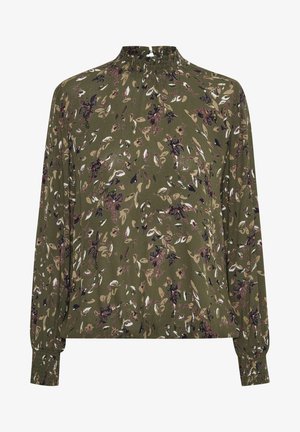 Blusa a maniche lunghe con collo alto arricciato, realizzata in un tessuto verde oliva decorato con motivi floreali colorati e polsini elasticizzati.