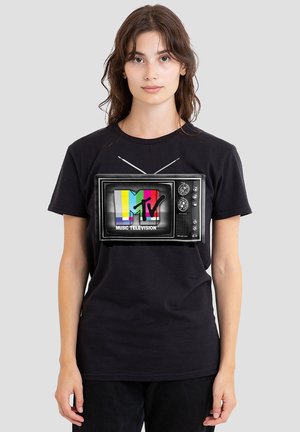 Black cotton t-shirt featuring a graphic of a vintage TV with colorful MTV logo. The shirt has a round neckline and short sleeves.