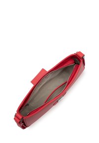 Red leather clutch bag with a zip closure, featuring an interior pocket, smooth texture, and a detachable shoulder strap.