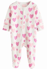 White ribbed onesie featuring pink hearts in various sizes, front zipper closure, and enclosed feet. Soft fabric suitable for babies.