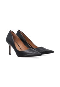 Sorte læder højhælede sko med spids tå og en slank stiletto hæl. Glat tekstur med en subtil indvendig foring detalje.