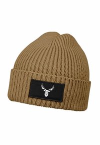 Tan knit beanie with a ribbed texture, featuring a black rectangular patch displaying a white deer head silhouette.