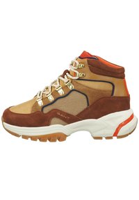 Brown and tan high-top sneaker with mixed materials, featuring metallic eyelets, orange accents, and a textured rubber sole.