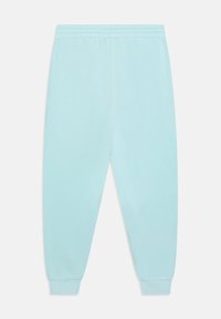 Nike Sportswear KYLIAN MBAPPÉ CLUB UNISEX - Teplákové kalhoty - glacier blue