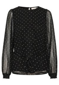 Blouse noire à manches longues transparentes, pois blancs, encolure ronde, poignets élastiques et lien à la taille pour un ajustement modulable.