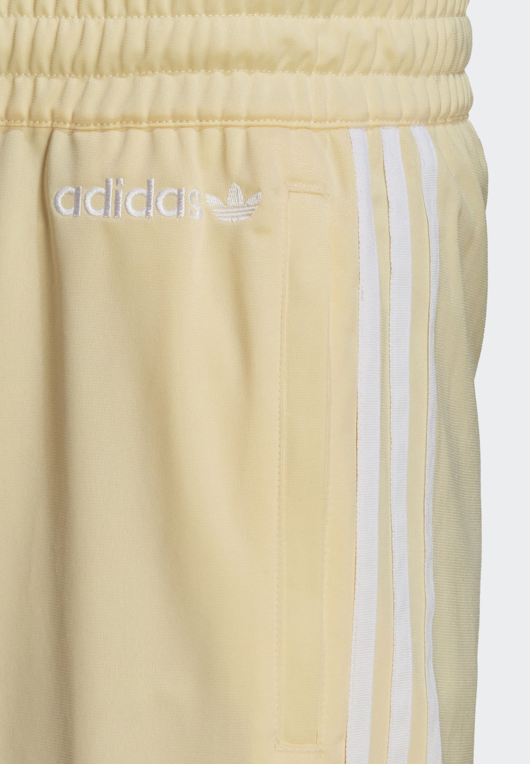adidas sst track pants yellow