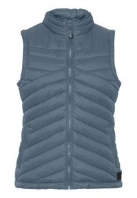 Gilet rembourré bleu clair avec un col haut, fermeture éclair sur toute la longueur et motif matelassé en chevrons. Comprend des poches latérales et une étiquette en bas.