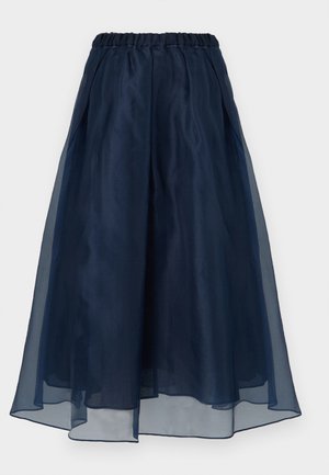 Jupe midi bleu marine avec taille élastique et superposition transparente, présentant un design fluide et superposé sur un fond uni.