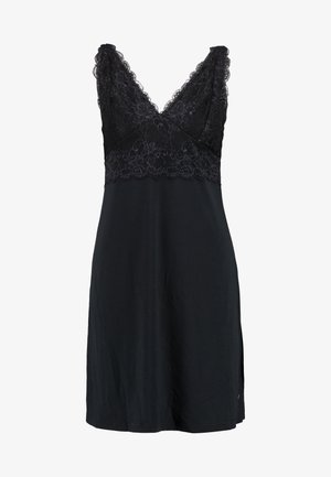 Mustmust öökleit, millel on pitsist bodice V-kaelusega, pehmest kangast ja külgedel lõhikud, et tagada liikumisvabadus.