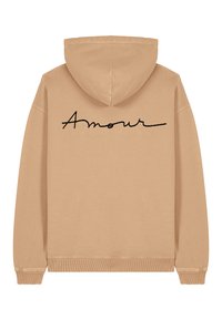 Felpa beige con un cappuccio ampio e polsini a costine. Presenta la scritta in corsivo nera "Amour" stampata sulla schiena. Tessuto morbido.