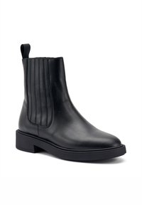 Stivali Chelsea neri in pelle con pannelli laterali elastici, punta arrotondata e tacco a blocco. Il design presenta sottili dettagli a righe verticali.