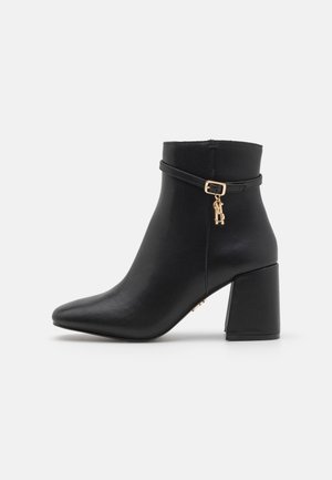 Ankle boots - black