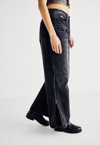 The Ragged Priest FERAL ZIP FLARES - Wide Leg - charcoal