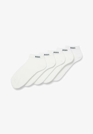 Five pairs of white ankle socks made of cotton blend, featuring a plain design with a black "BOSS" logo on the cuffs.
